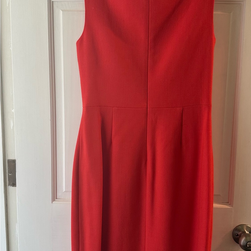 Coral Lela Rose dress with floral buttons.